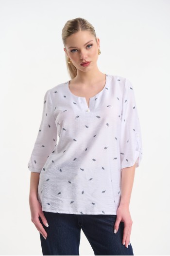 Blouse with decorative button